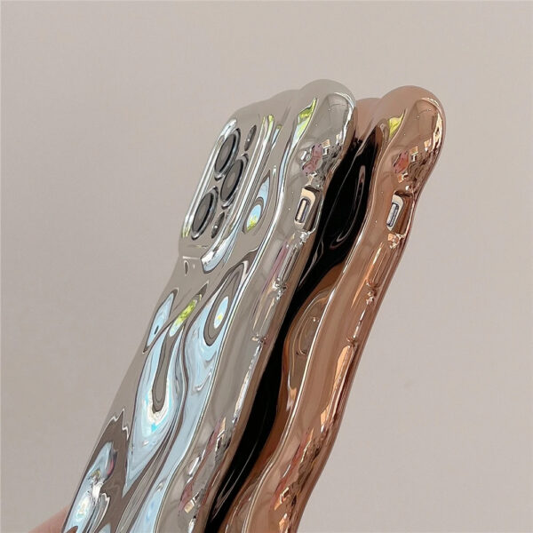 Side View of Glossy Wavy iPhone Cases in Silver and Gold