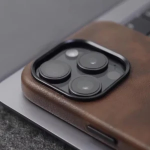 Close-up of iPhone 16 camera cutout with leather case