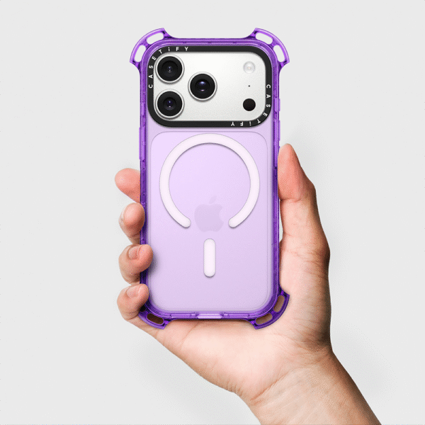 Casetify Bounce Case purple variant held in hand with MagSafe ring