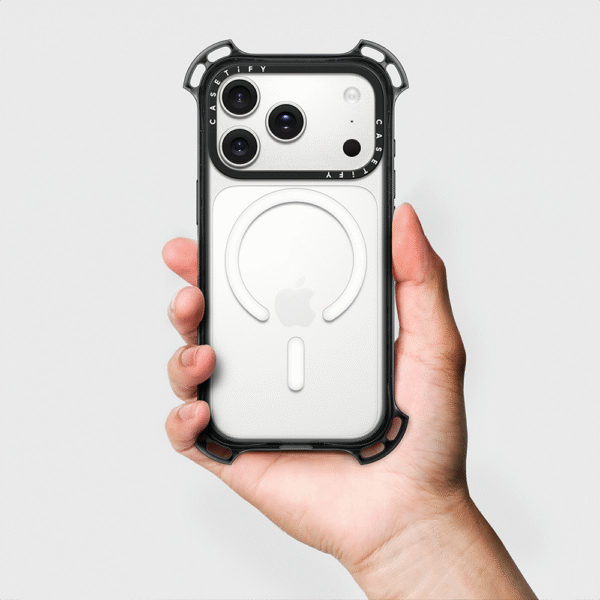 Black Casetify Bounce Case held in hand with MagSafe ring
